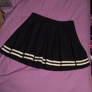 pleated black miniskirt